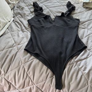 This top worn one time XL fits like a L